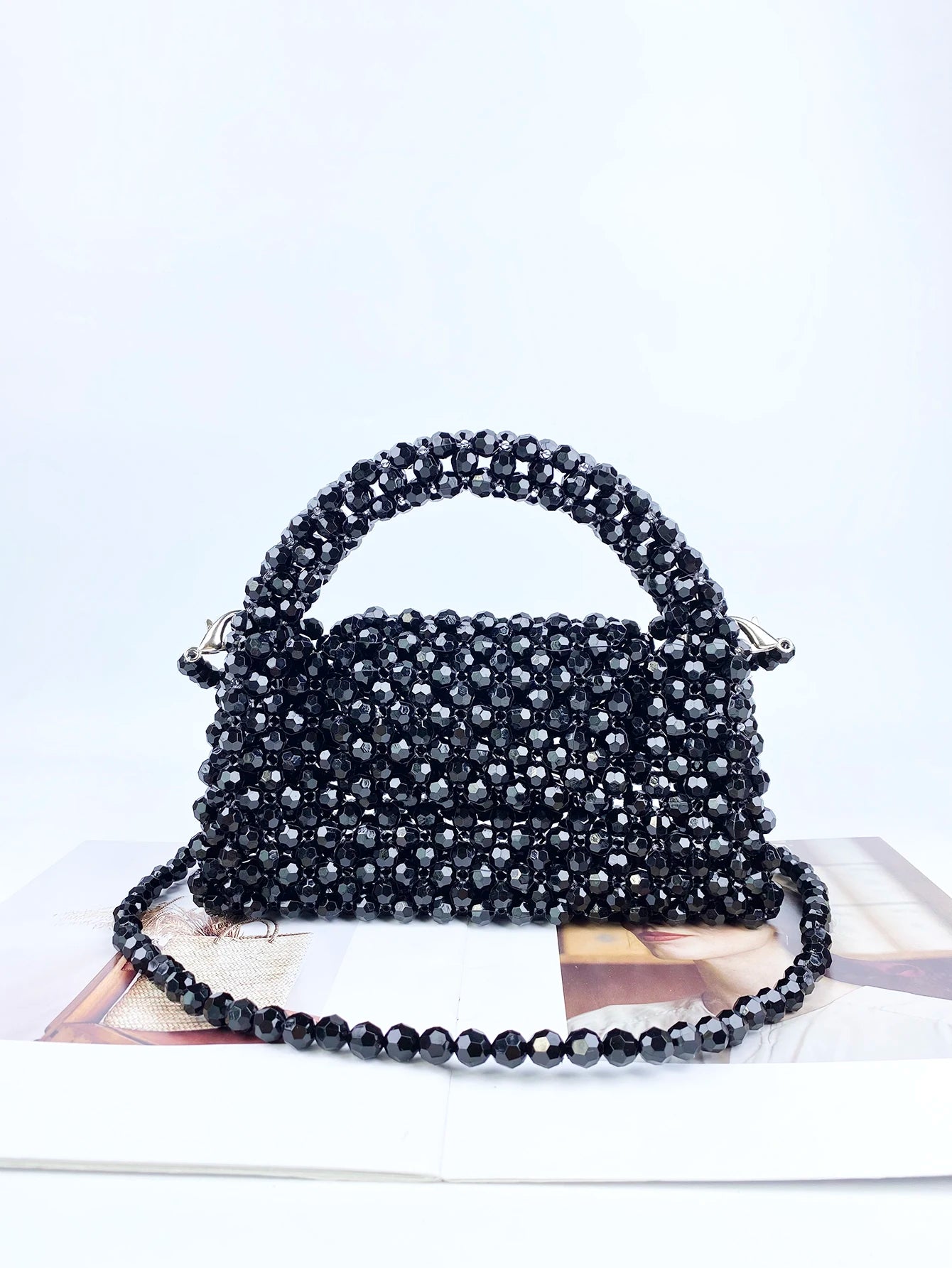 Bestselling and popular beaded handheld phone bag, small square bag, black beads, fashionable and versatile woven bag