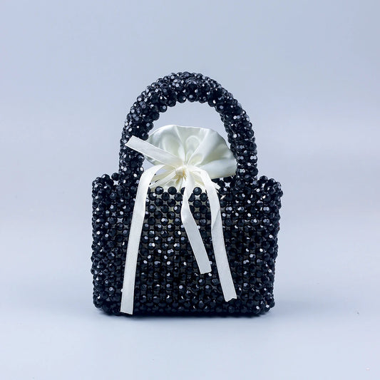 Korean version handmade beaded hand-held small square bag with black beads, fashionable and casual, versatile woven bag