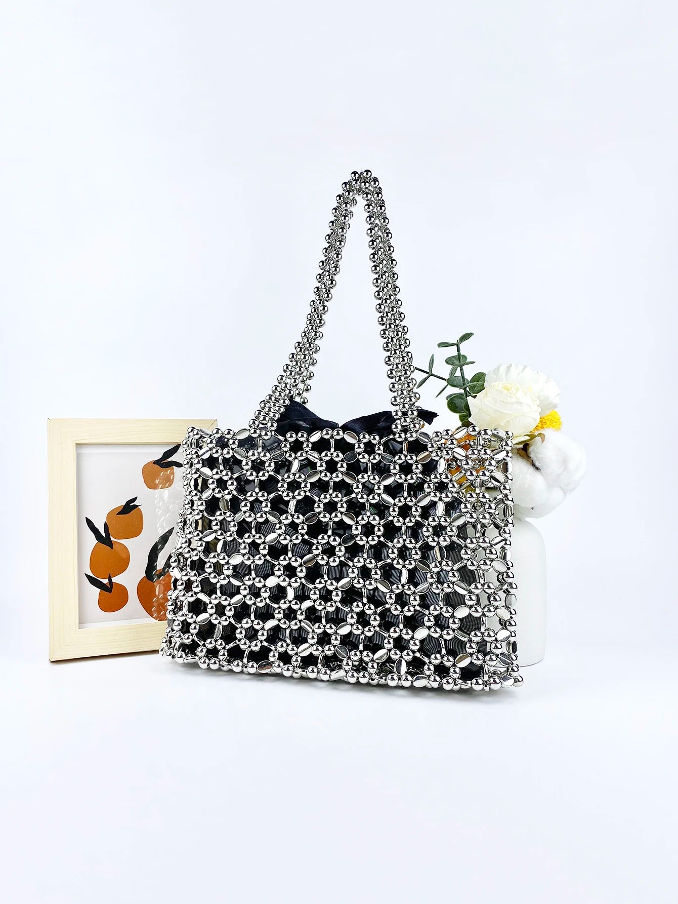 Fashionable niche retro shiny silver beaded bag woven lightweight hollow beaded versatile shoulder bag