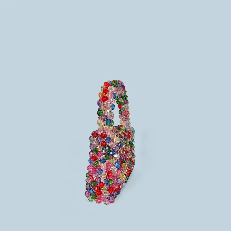 Autumn and winter new bead bag dopamine style hand-held finished product bag hand woven multi-color candy bag